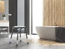 Lets-Frisbee-bathstool-shower-chair-healthcare-trust-care-design-lighter-1-e1710323567876.webp