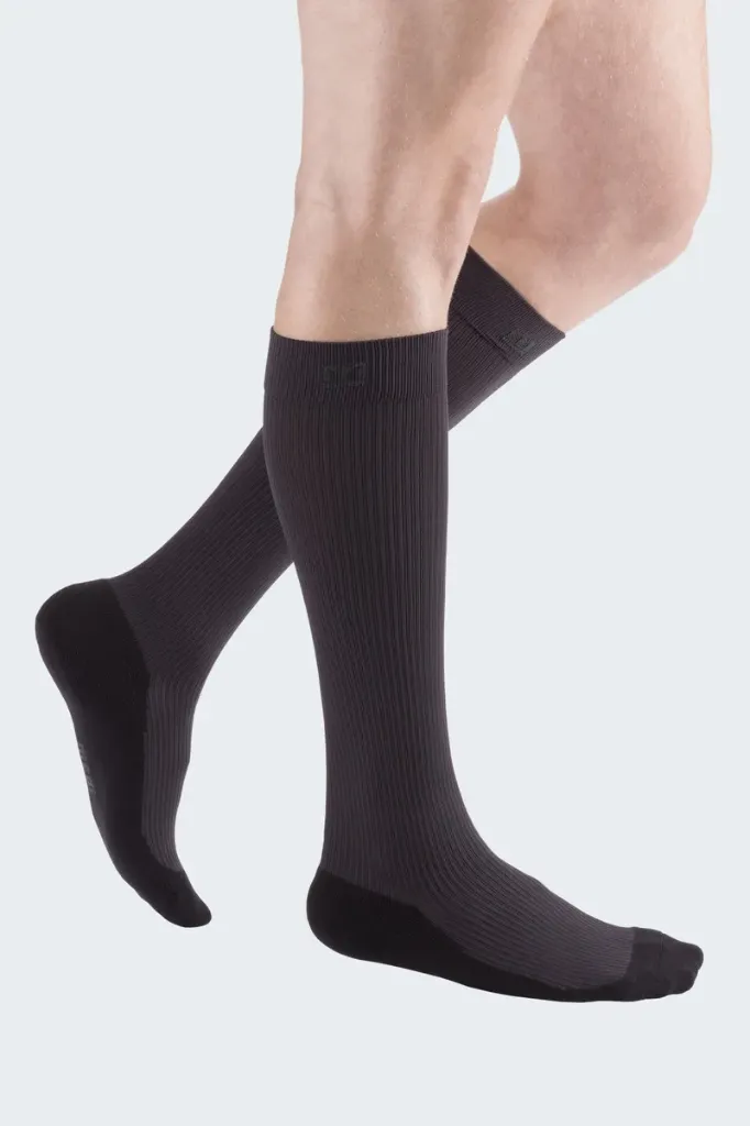 man-with-grey-compression-stockings-m-26965.webp